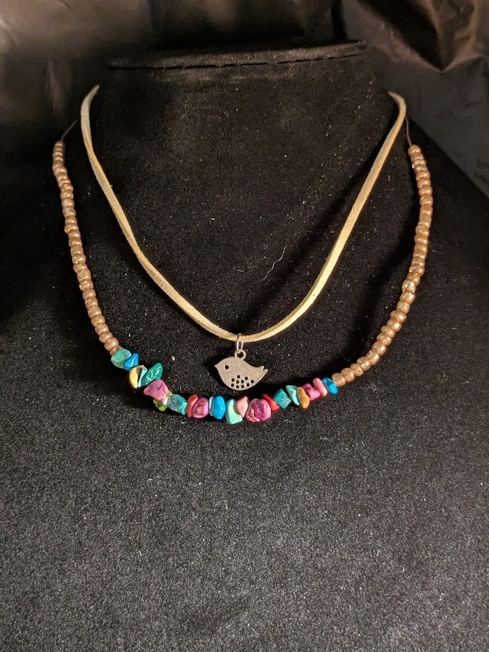 Double necklace with bird