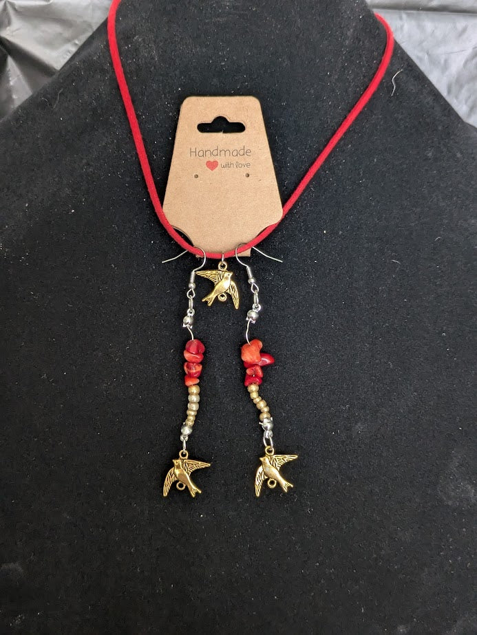 Necklace earrings set with gold bird