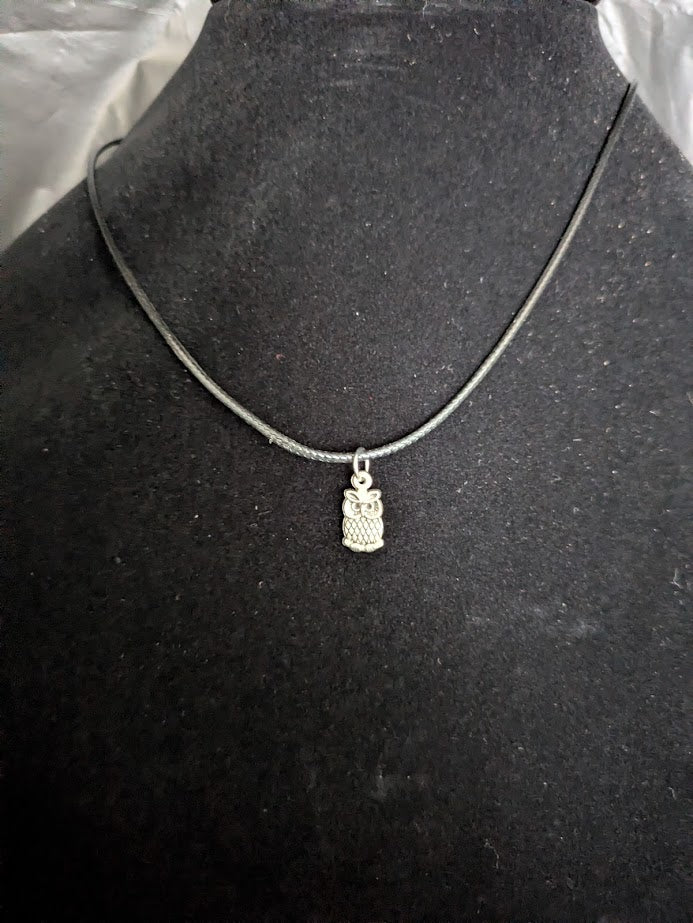 Black corded necklace with owl