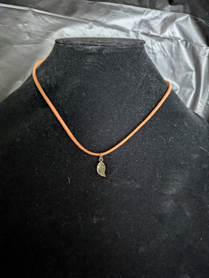 Orange cord with gold leaf