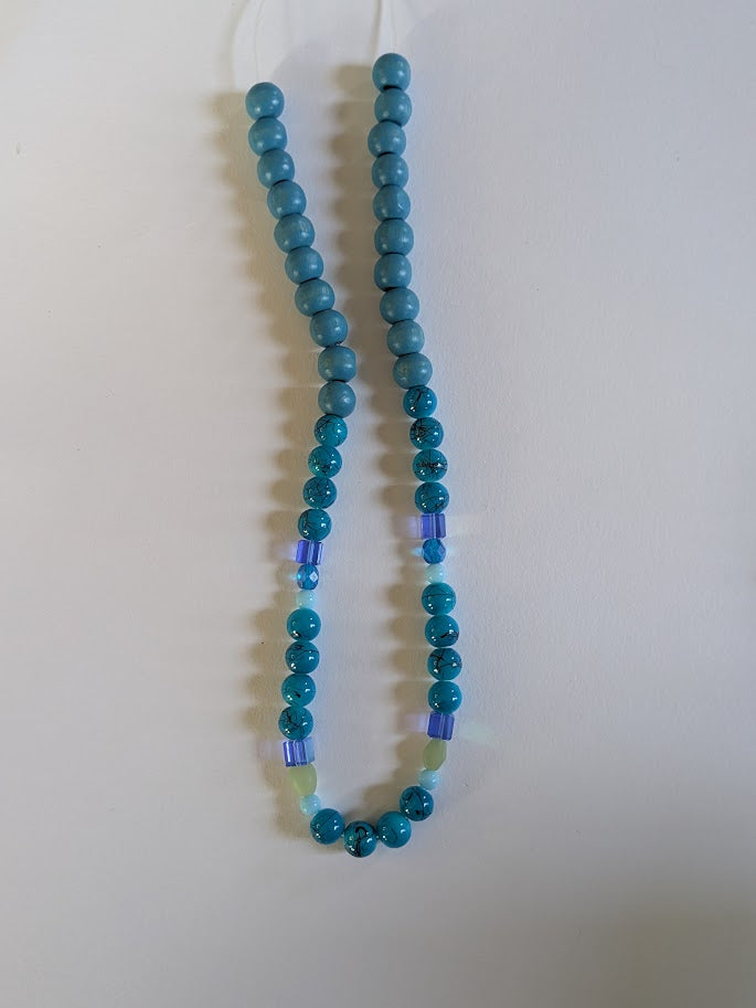 Blue wooden bead with glass square