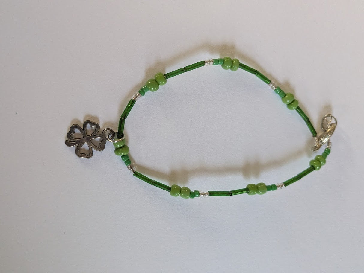 Green beaded Bracelets with luck charm